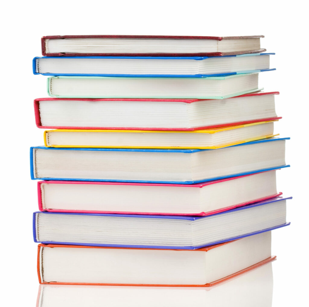 Symbolbild: Stapel neuer bunter Bücher